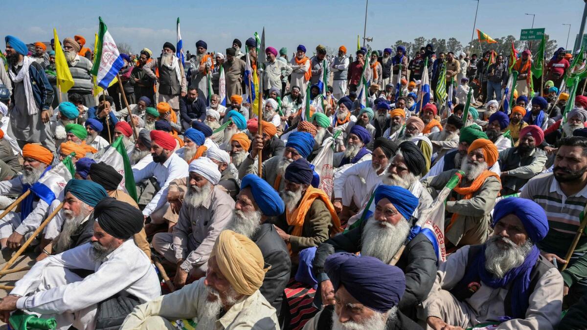 Farmers gather during an ongoing protest to demand minimum crop prices, near the Punjab-Haryana state border at Shambhu in Patiala district on February 22, 2024. Photo: AFP