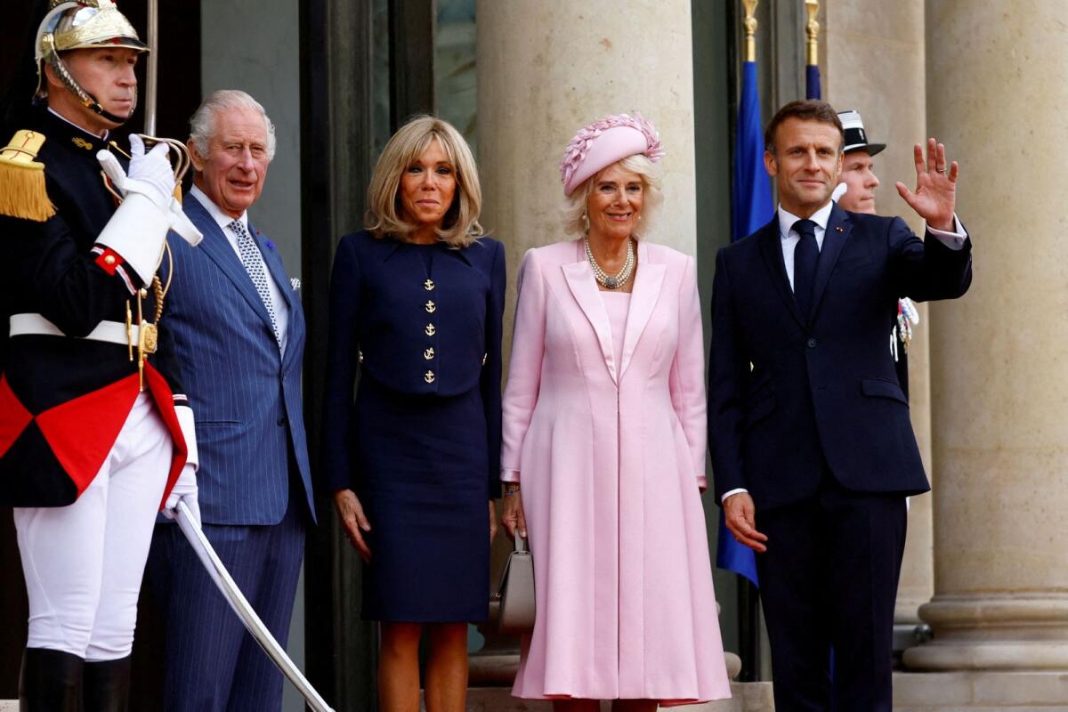 French President Emmanuel Macron, his wife Brigitte Macron, Britain's King Charles and Queen Camilla arrive for a meeting at the Elysee Palace in Paris, on the first day of their State visit to France, September 20, 2023. Photo: Reuters