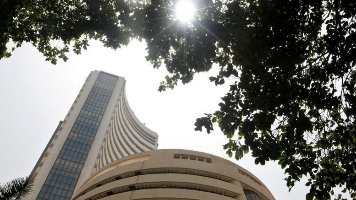 Sensex jumps 300 points, Nifty ends near 11,800  