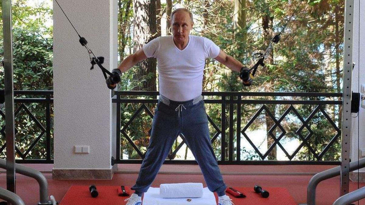Russian President Vladimir Putin exercises at the Black Sea resort of Sochi, Russia