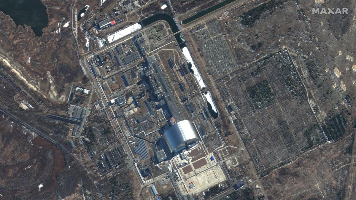 (FILES) This file photo shows a Maxar satellite image taken and released on March 10, 2022 of an overview of the Chernobyl Nuclear Power Plant in Pripyat, Ukraine. Photo: AFP