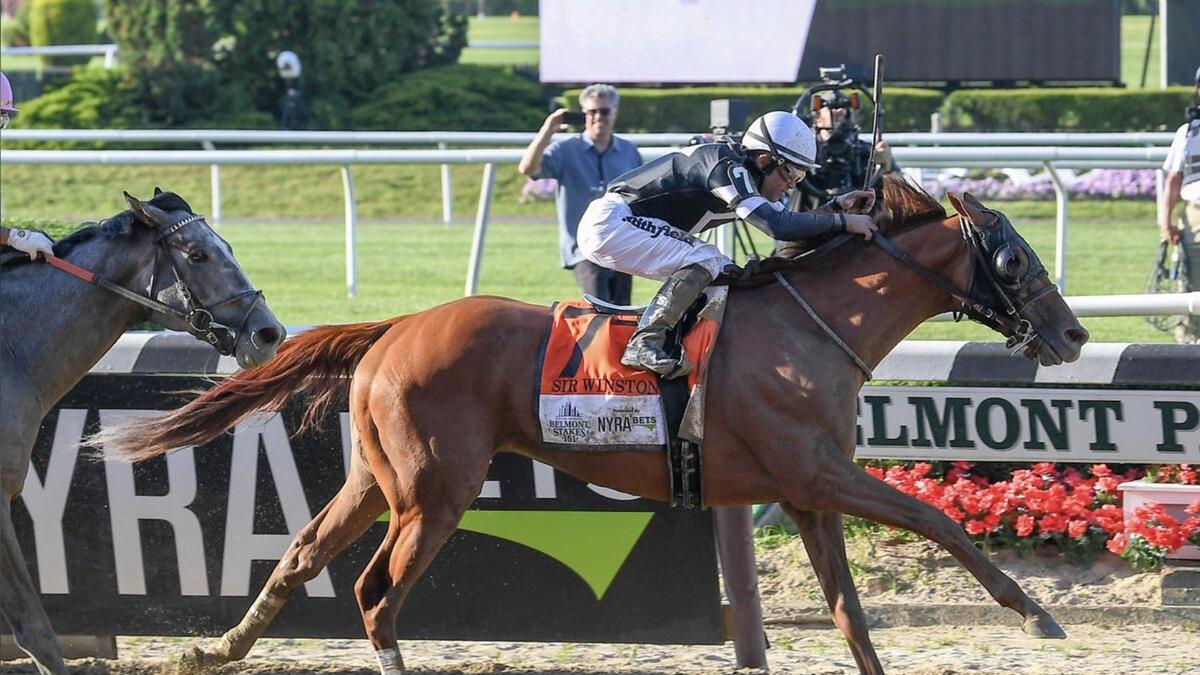Jockey Joel Rosario and Sir Winston win the 151st running of the Belmont Stakes at Belmont Park last year. - Agencies