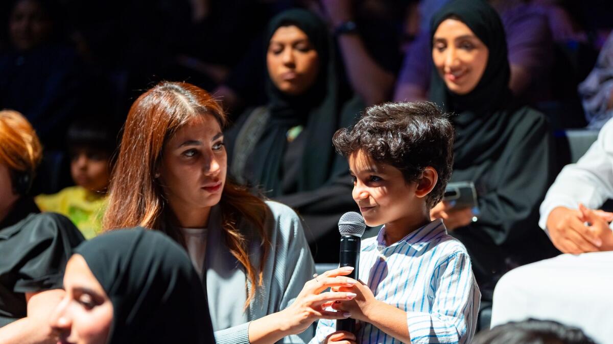 A boy asks a question to astronaut Sultan AlNeyadi the Abu Dhabi edition of 'A Call from Space' event.