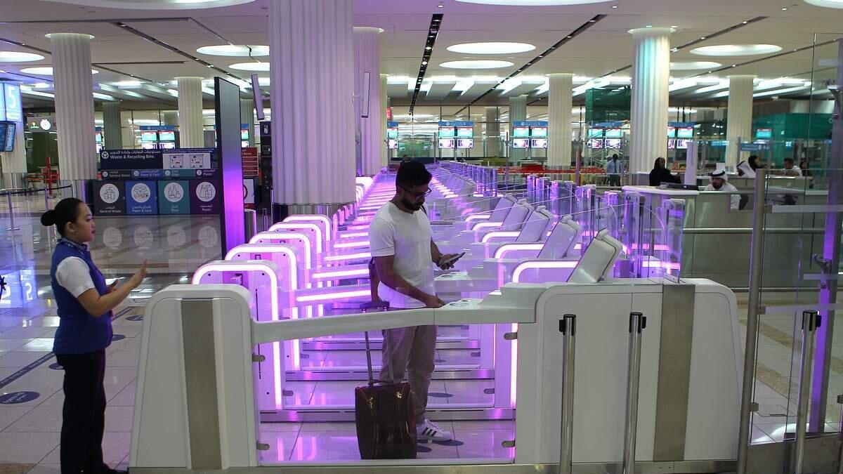 A passenger passing through newly introduced Smart Gates at Dubai International Airport Terminal 3
