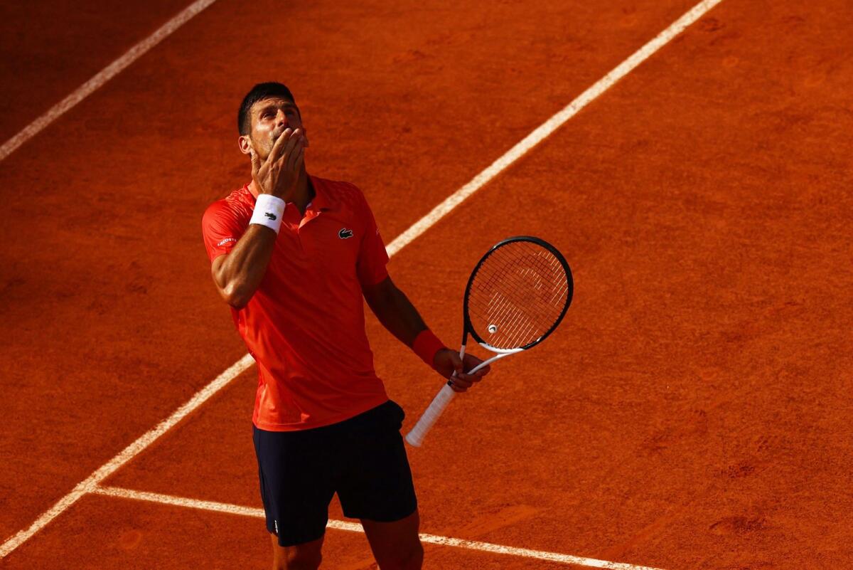Serbia's Novak Djokovic celebrates winning his semifinal match against Spain's Carlos Alcaraz. — Reuters