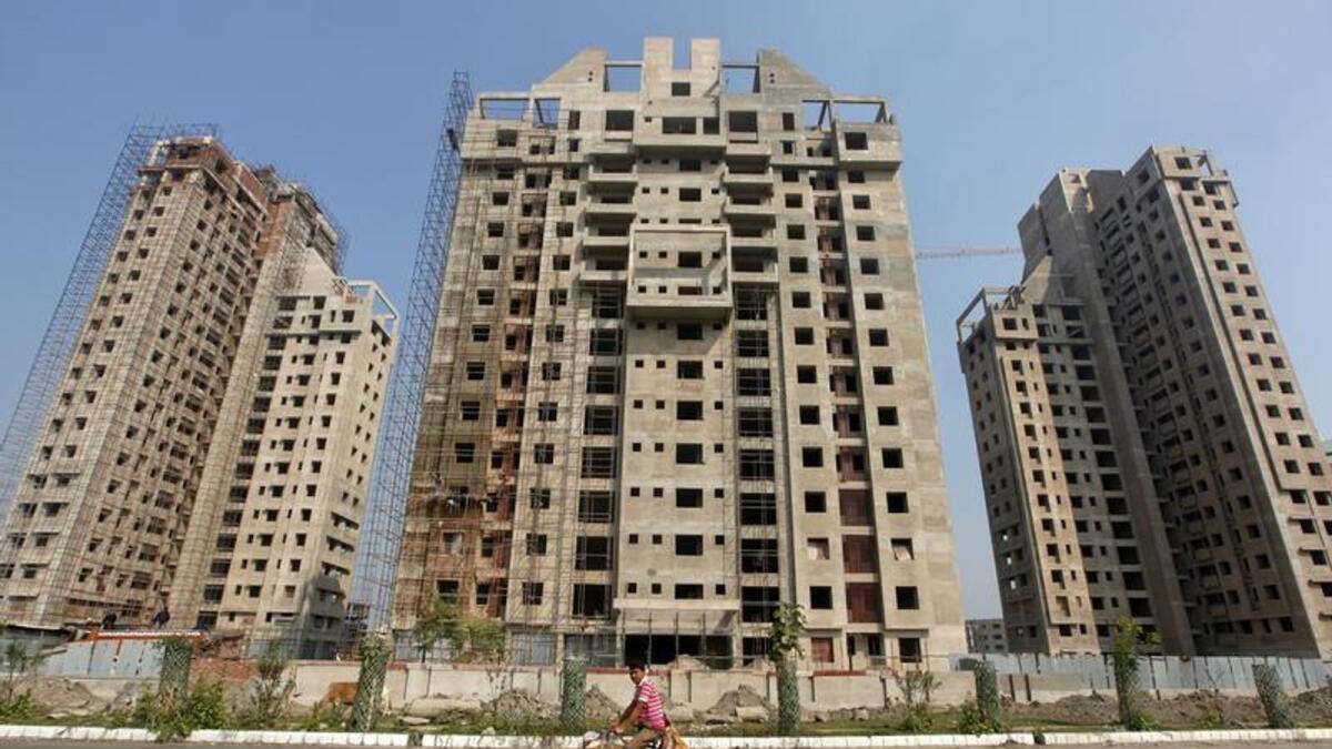 Residential buildings under construction in Kolkata. There is always going to be huge appetite for residential real estate in the country, Colliers says. - Reuters file