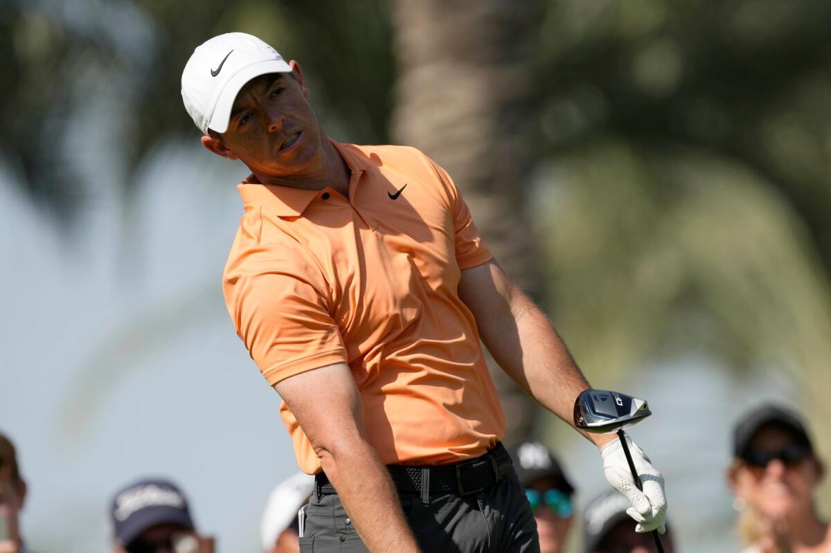 Rory McIlroy of Northern Ireland reacts on the 7th hole during the final round of the Dubai Invitational. - AP