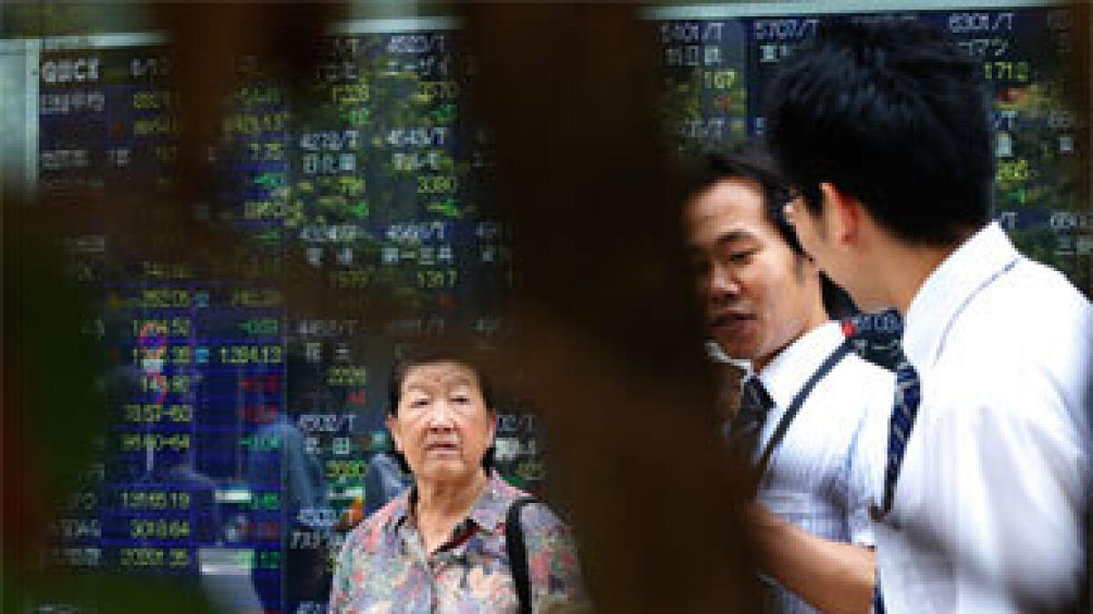 World stocks fall as China trade growth slides