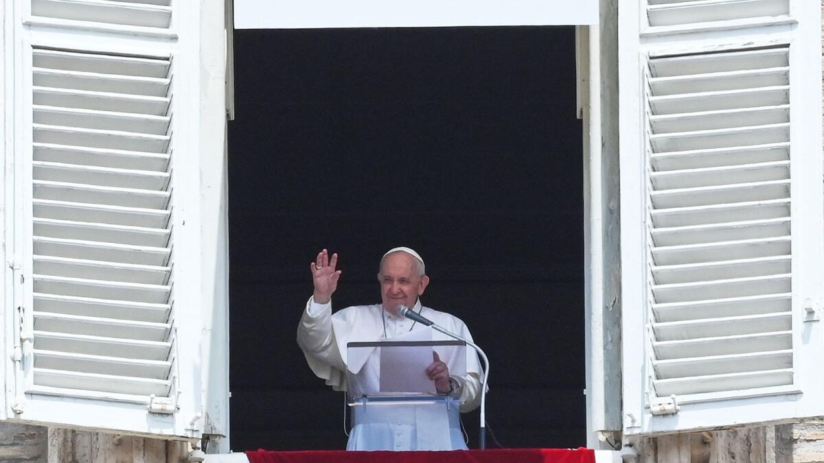 Pope Francis delivers the Sunday Angelus prayer from the window of his study overlooking St.Peter's Square at the Vatican.