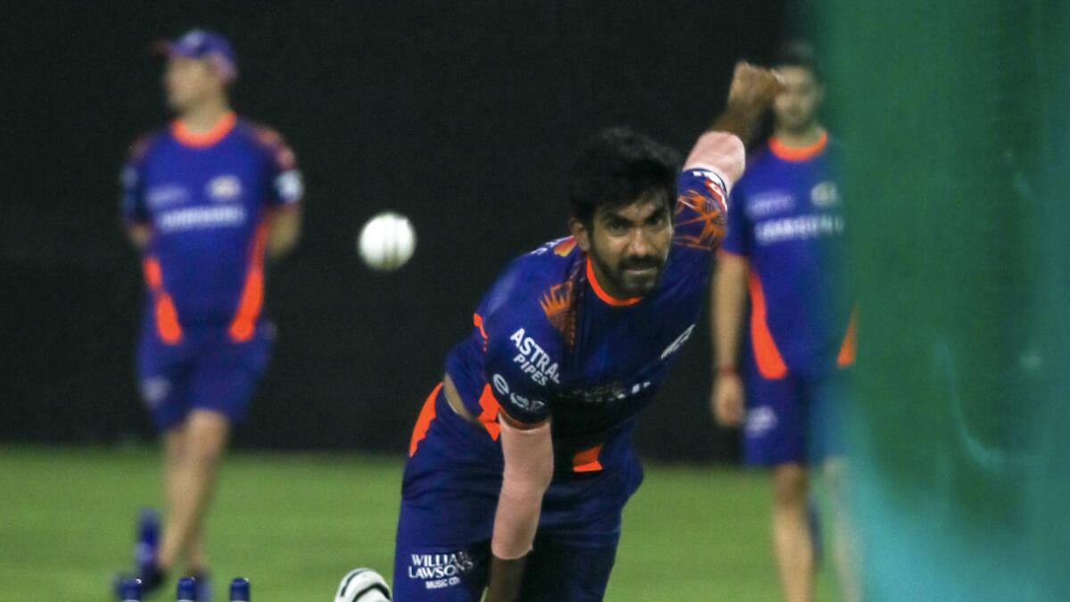 Mumbai Indians' star bowler Jasprit Bumrah bowls during a net session. The defending champions attended their first training session at the Zayed Cricket Stadium in Abu Dhabi on Friday.