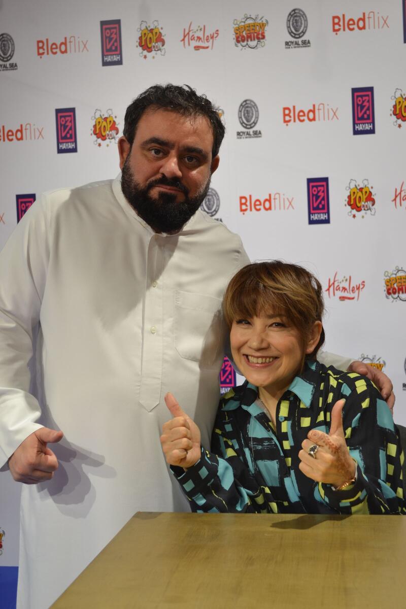 Rica Matsumoto with Dr Rashed AlFarooq, CEO of Speedy Comics.