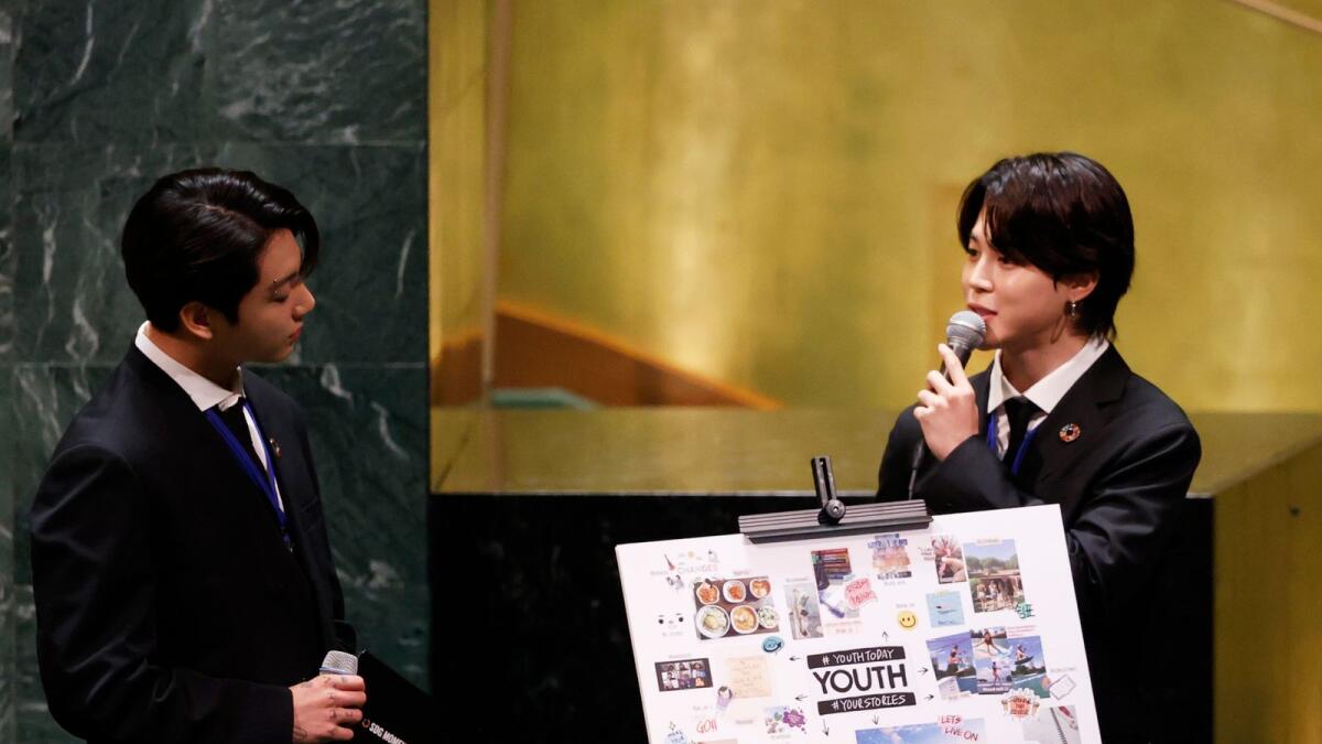 Members of South Korean K-pop band BTS Jung Kook, left, and Jimin. (Photo/AP)