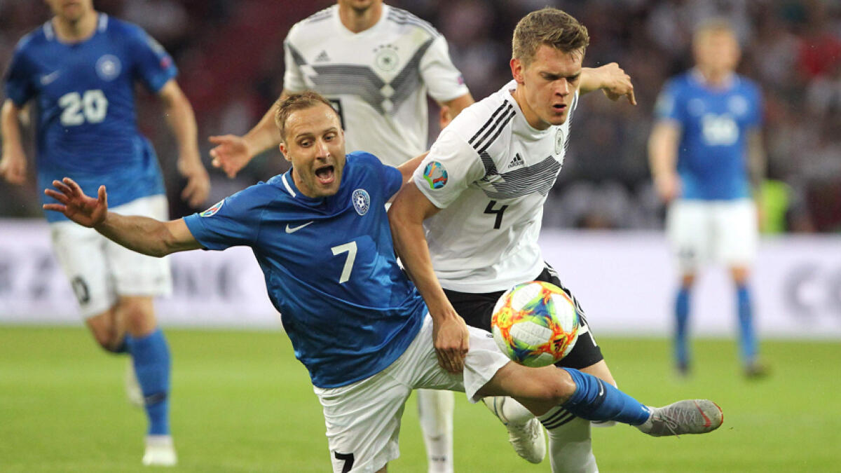 Germany rout Estonia; Northern Ireland earn late win