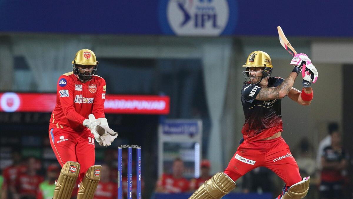 Royal Challengers Bangalore captain Faf du Plessis plays a shot during the match against Punjab Kings in Mumbai on Sunday. (PTI)