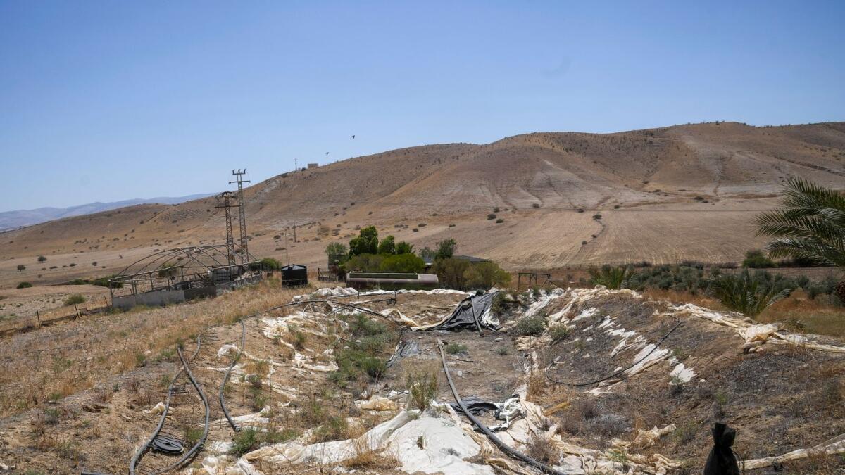 A dried water basin is seen near the Palestinian village of Bardala in the Jordan Valley  onMonday, Aug. 7, 2023. -- AP