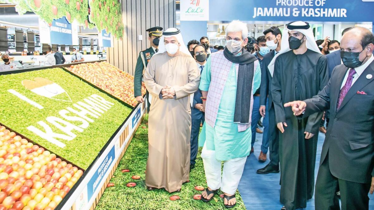 Manoj Sinha along with Dr. Thani bin Ahmed Al Zeyoudi, Yusuffali MA, and other dignitaries tour during the 'Kashmir Promotion Week' at LuLu Hypermarket, Silicon Central Mall in Dubai.