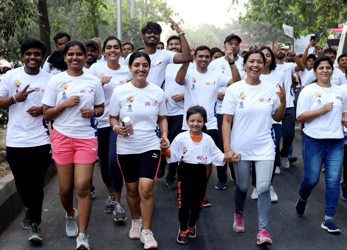 People take part in 'Vote-a-thon', a marathon organised in Bengaluru on Sunday to raise voter awareness ahead of General Elections 2024. — PTI