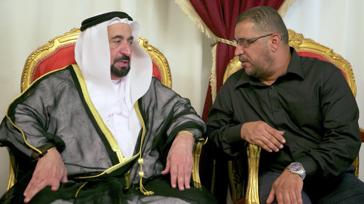 Dr Shaikh Sultan at mourning tent of Obaida Al Aqrabawi in Sharjah’s industrial area. - Wam