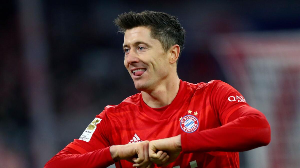 Robert Lewandowski won the German league and cup double as well as the Champions League with Bayern. (AP)