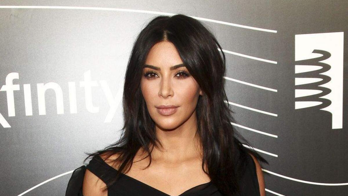 Shaken Kim Kardashian postpones Dubai event after robbery