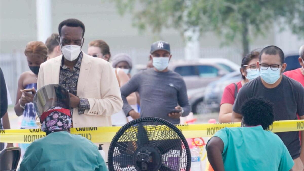 People line up to get tested for Covid-19 in North Miami, Florida. — AP