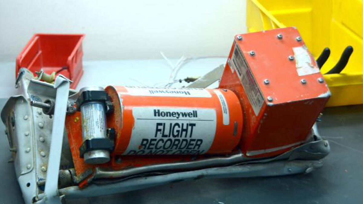 Russian plane black boxes point to attack, Putin halts flights
