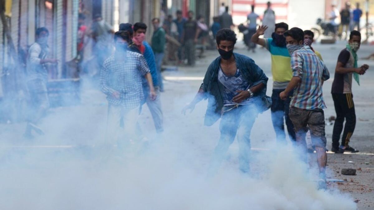 Several injured as people defy curfew to protest in Kashmir
