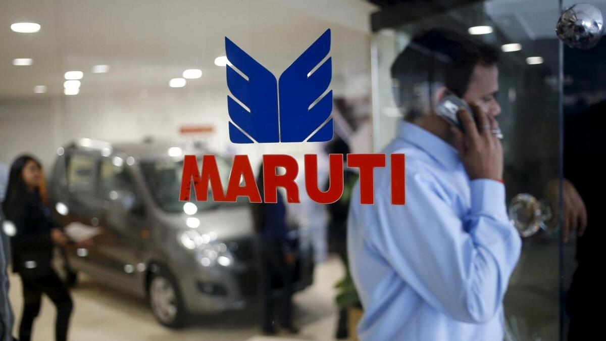 India auto giant Maruti cuts car prices amid economic woes 