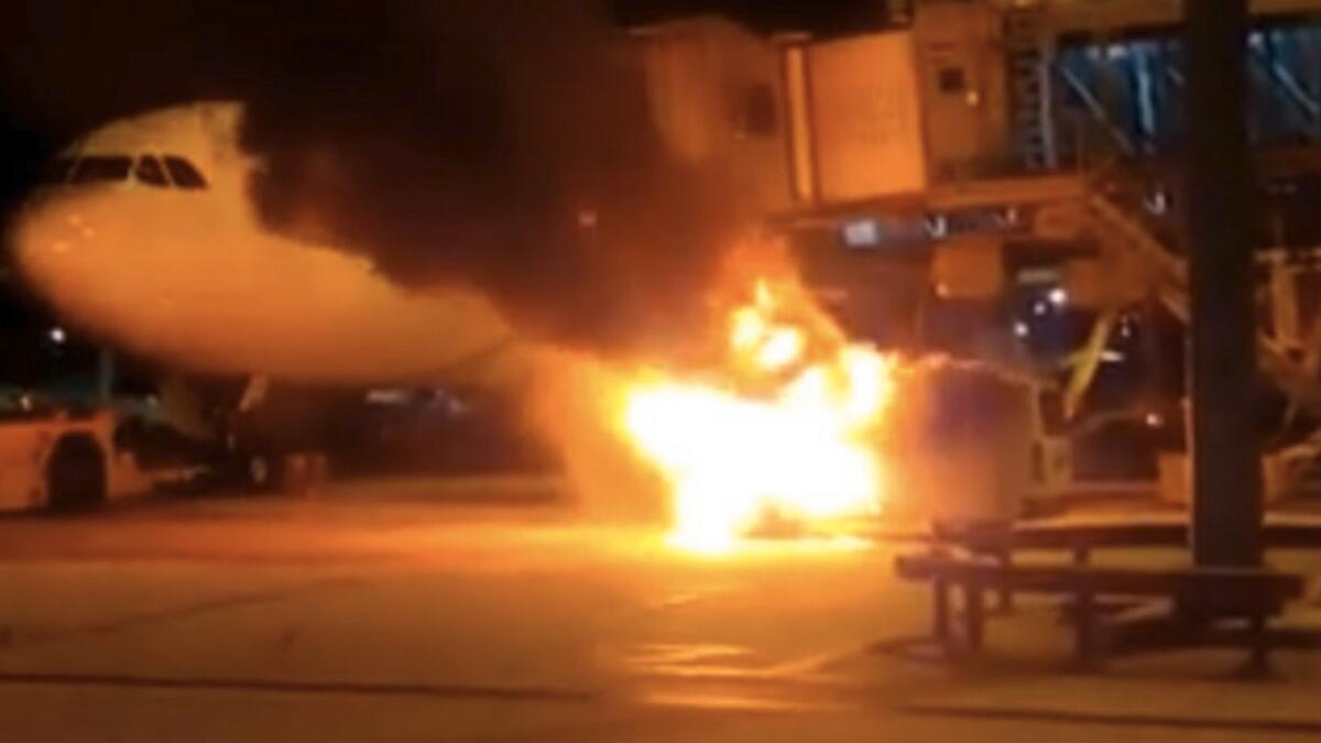Video: Vehicle goes up in flames at Hong Kong airport