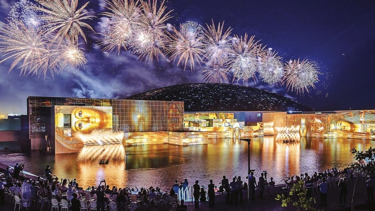 An audio-visual presentation reveals masterpieces from the museum projected across the building under an incredible fireworks display, on the eve of Louvre Abu Dhabi’s opening. — Supplied photo