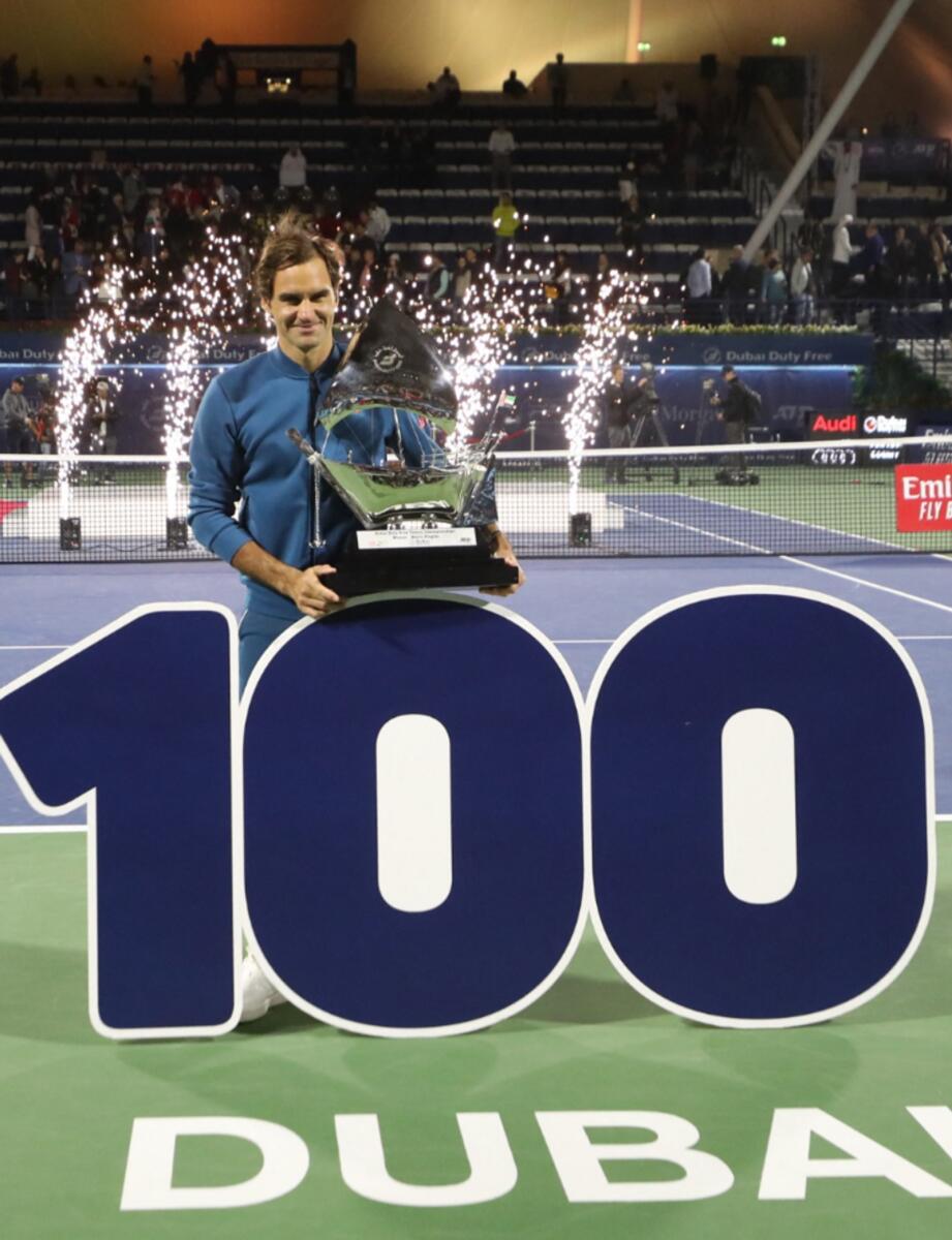 Roger Federer after winning his 100th career title at the Dubai Tennis Championships. — AFP file