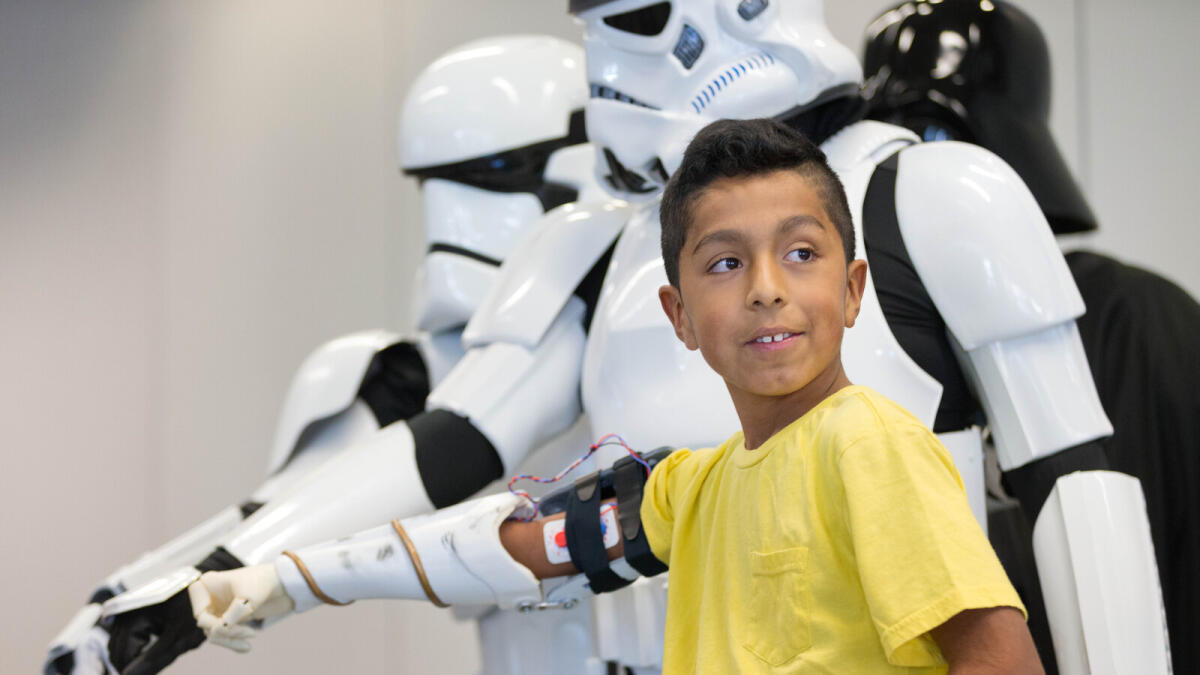 Nebraska boy presented prosthetic arm by Star Wars group