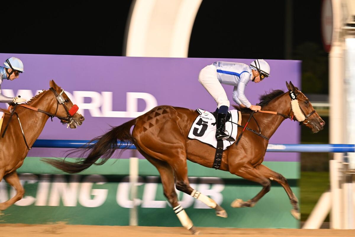 Mimi Kakoushi and Mickael Barzalona winning the Group 3 UAE Oaks on the seventh night of the Dubai World Cup Carnival. — Photo by Kareem Dawaba