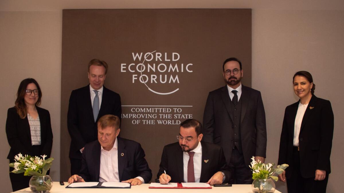Saeed Al Eter, assistant secretary-Ggeneral of the Mohammed bin Rashid Al Maktoum Global Initiatives, and Sean De Cleene, member of the executive committee of the World Economic Forum, signing the agreement in Davos. — Supplied photo