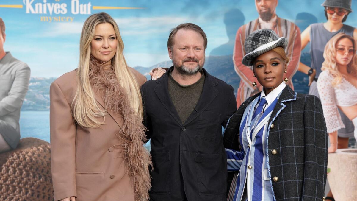 Kate Hudson, Director Rian Johnson and Janelle Monae at a photo call for 'Glass Onion' in London