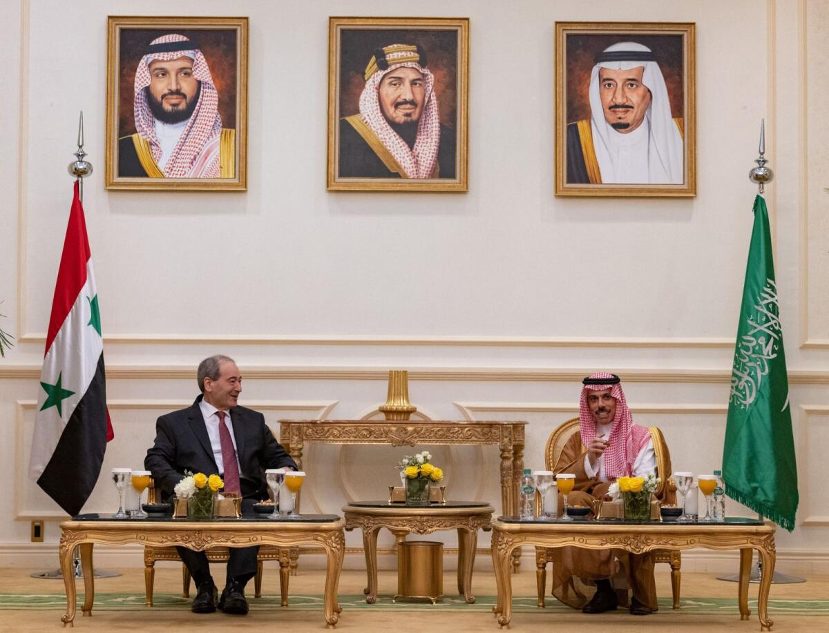 Saudi Foreign Minister Prince Faisal bin Farhan bin Abdullah meets with Syrian Minister of Foreign Affairs and Expatriates Faisal Mekdad in Jeddah, Saudi Arabia,  on Wednesday. -- Reuters
