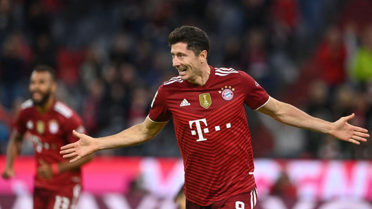 Bayern Munich's Robert Lewandowski celebrates a goal against Hertha during the Bundesliga match.— AFP