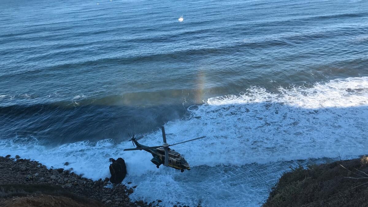 Woman falls off cliff, California