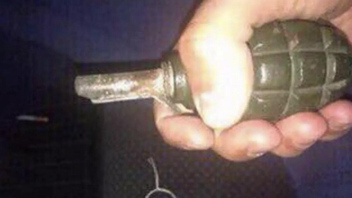 Man dies while posing for picture with hand grenade