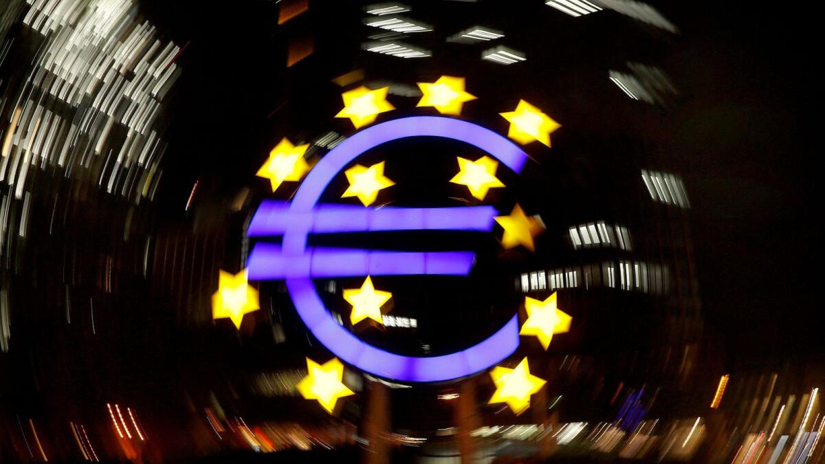 The euro sign is photographed in front of the former headquarters of the European Central Bank in Frankfurt, Germany. — Reuters