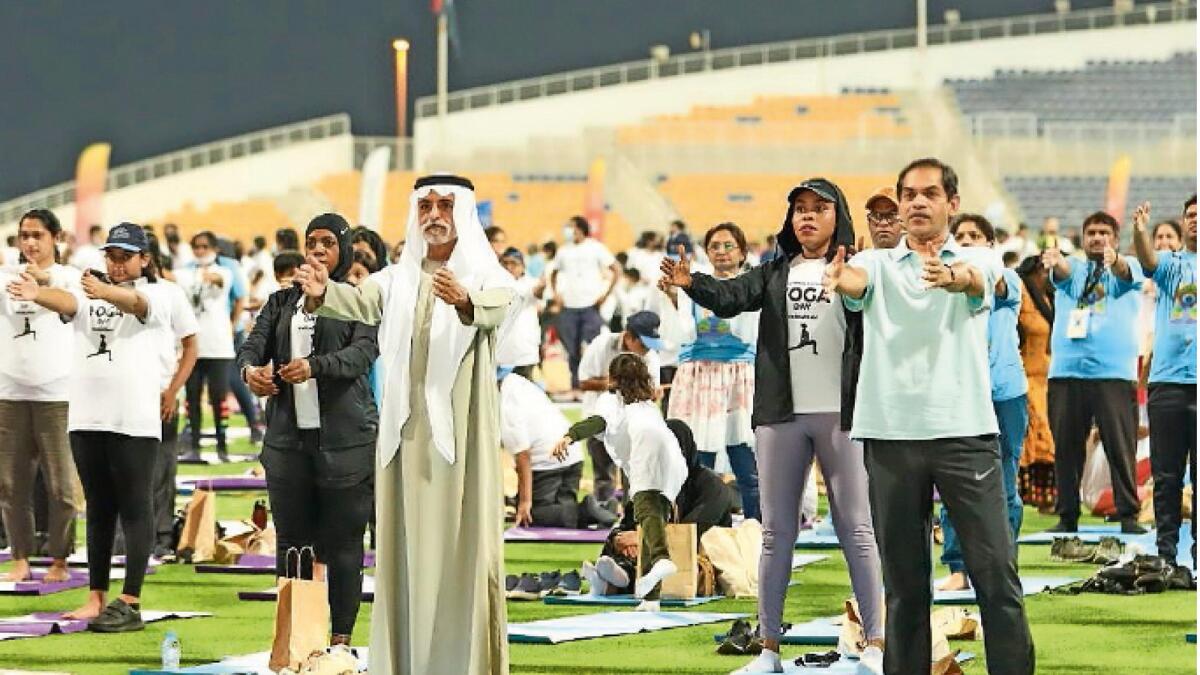 Sheikh Nahyan bin Mubarak Al Nahyan, Minister of Tolerance and Coexistence, with Sunjay Sudhir on the occasion of International Day of Yoga 2022 at Zayed Cricket Stadium, Abu Dhabi.