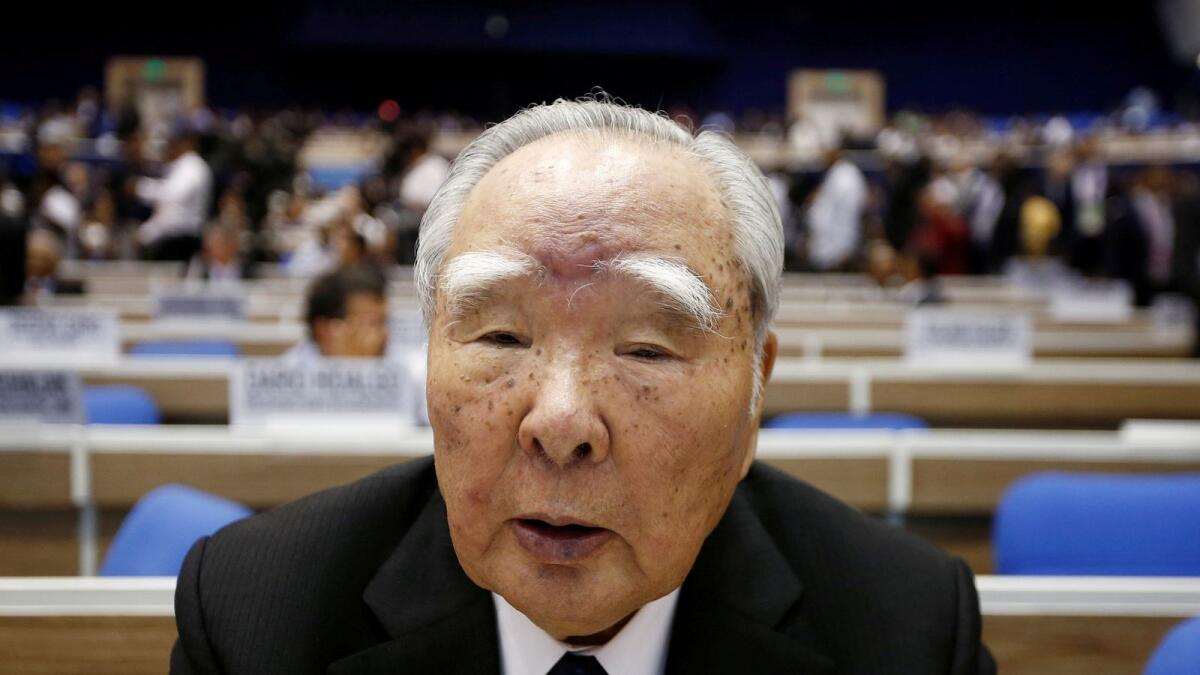 Suzuki Motor Chairman Osamu Suzuki attends the Global Mobility Summit in New Delhi. — Reuters file