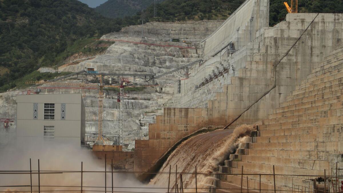 Water flows through Ethiopia's Grand Renaissance Dam as it undergoes construction work on the river Nile in Guba Woreda, Benishangul Gumuz Region, Ethiopia.