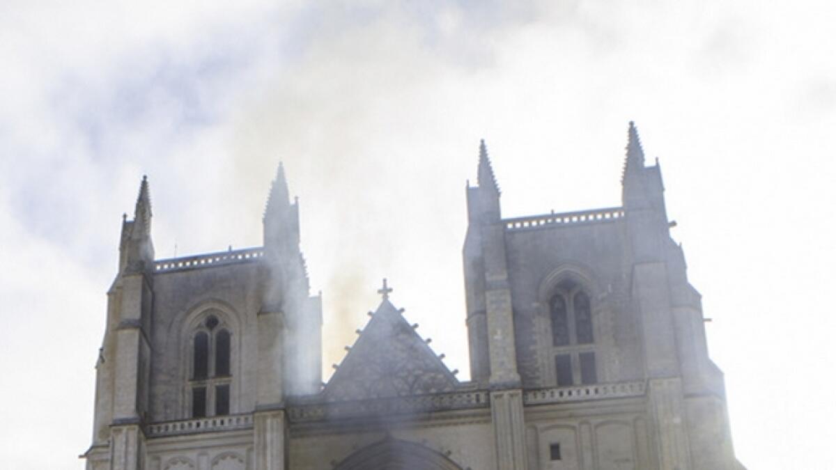 French cathedral, arson, damages