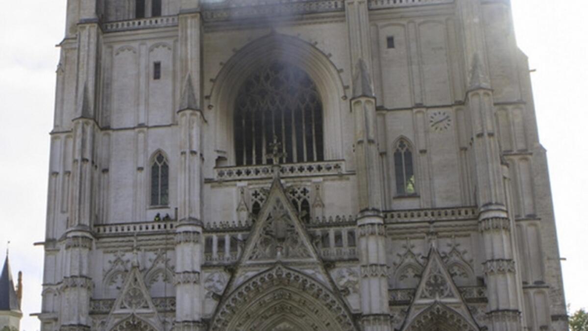 French cathedral, arson, damages