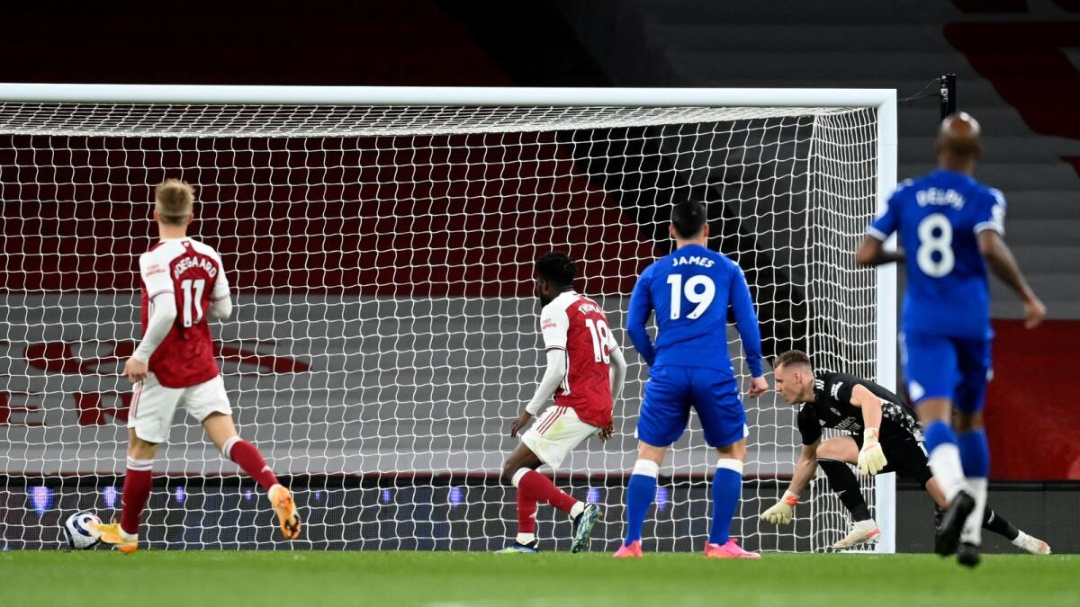 Arsenal's goalkeeper Bernd Leno (second right) scores an own goal during the English Premier League match against Everton.— AP
