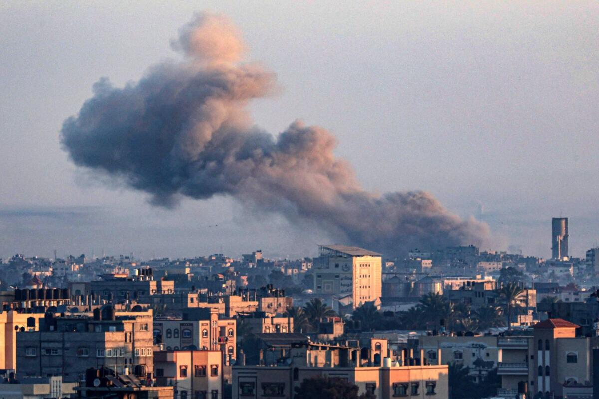 Smoke billowing over Khan Yunis in the southern Gaza Strip during Israeli bombardment on December 30, 2023. Photo: AFP