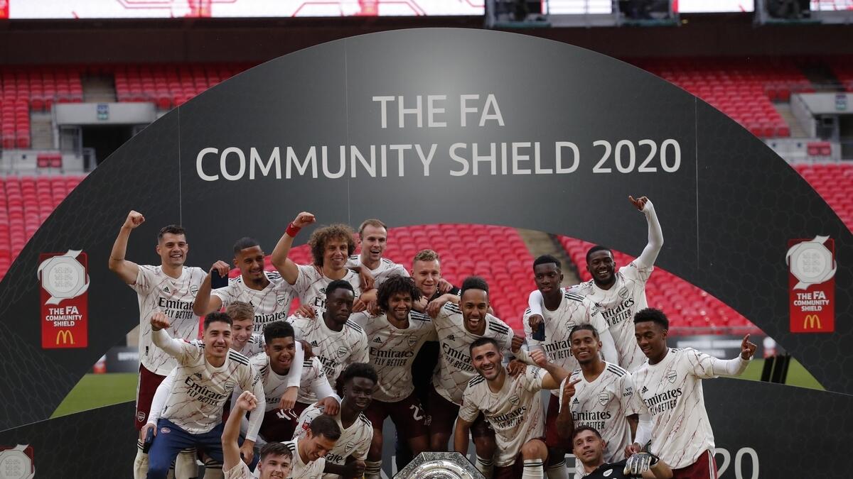 Arsenal players celebrate winning the FA Community Shield match against Arsenal at Wembley stadium.