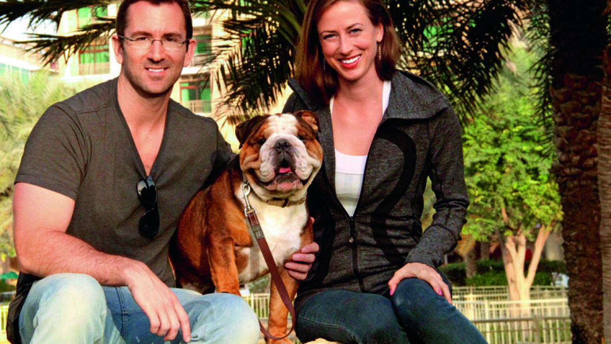 FUR FAMILY: Robert Kelly and Katherine Cebrowski with their English bulldog, Maximus