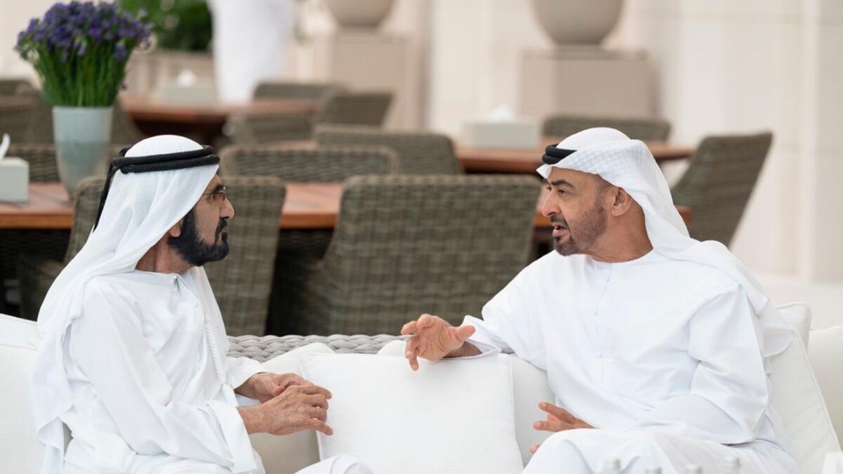 Sheikh Mohammed bin Rashid Al Maktoum and Sheikh Mohamed bin Zayed exchange Eid gretings in Abu Dhabi on Friday. — Wam